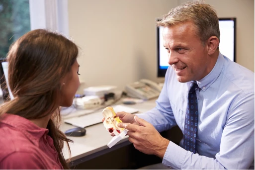 Doctor in practice with patient